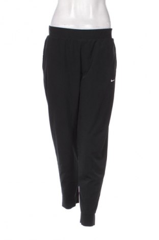 Damskie spodnie sportowe Nike, Rozmiar L, Kolor Czarny, Cena 82,53 zł