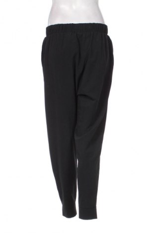 Damskie spodnie sportowe Nike, Rozmiar L, Kolor Czarny, Cena 82,53 zł