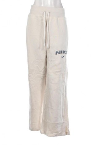 Дамско спортно долнище Nike, Размер XXL, Цвят Бежов, Цена 65,99 лв.