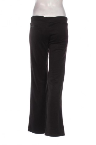 Γυναικείο αθλητικό παντελόνι PUMA, Μέγεθος S, Χρώμα Μαύρο, Τιμή 20,97 €