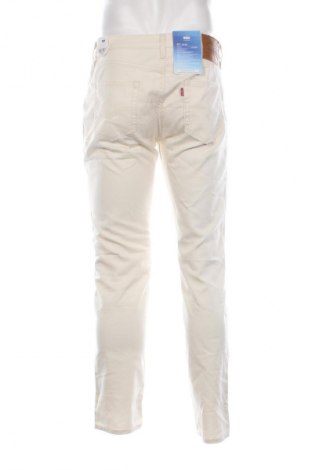 Męskie jeansy Levi's, Rozmiar L, Kolor ecru, Cena 464,99 zł