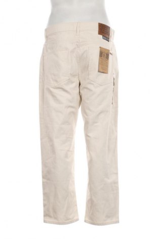 Pánske džínsy  Volcom, Veľkosť L, Farba Kremová, Cena  87,67 €
