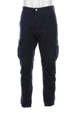 Pánske nohavice  Tommy Jeans, Veľkosť L, Farba Modrá, Cena  107,95 €