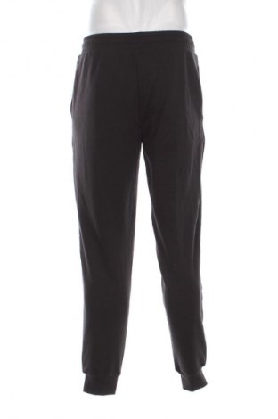 Męskie spodnie sportowe PUMA, Rozmiar M, Kolor Czarny, Cena 290,99 zł