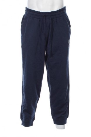 Męskie spodnie sportowe PUMA, Rozmiar XL, Kolor Niebieski, Cena 290,99 zł