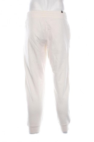 Pantaloni trening de bărbați PUMA, Mărime M, Culoare Ecru, Preț 342,99 Lei