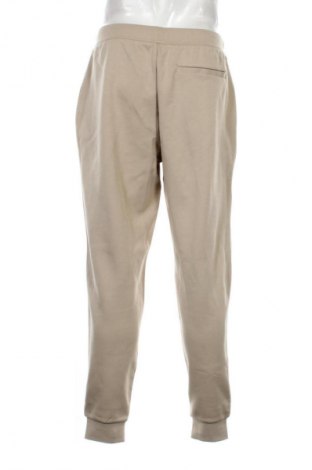 Pantaloni trening de bărbați Tommy Hilfiger, Mărime L, Culoare Bej, Preț 449,99 Lei