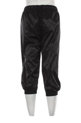 Męskie spodnie sportowe Umbro, Rozmiar M, Kolor Czarny, Cena 40,99 zł