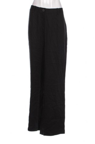 Γυναικείο παντελόνι Guido Maria Kretschmer for About You, Μέγεθος XL, Χρώμα Μαύρο, Τιμή 13,01 €