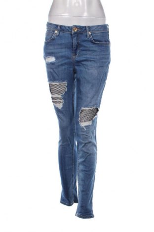 Damskie jeansy River Island, Rozmiar M, Kolor Niebieski, Cena 131,99 zł