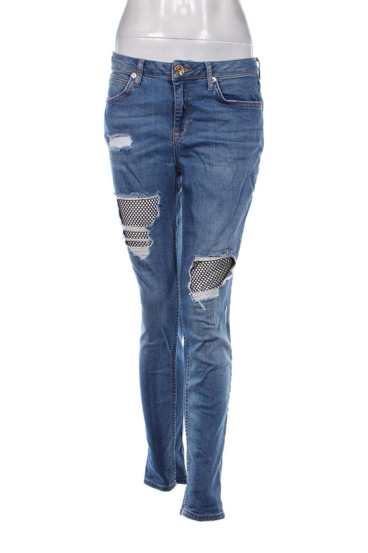 Damskie jeansy River Island, Rozmiar M, Kolor Niebieski, Cena 56,99 zł