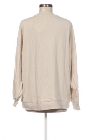Bluzka damska H&M, Rozmiar L, Kolor Beżowy, Cena 57,99 zł