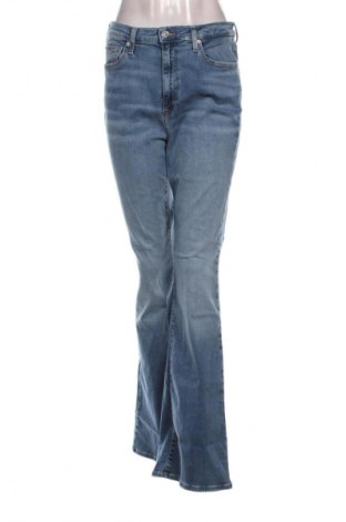 Дамски дънки Tommy Jeans, Размер L, Цвят Син, Цена 174,99 лв.