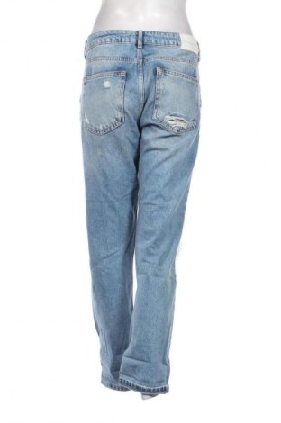 Damskie jeansy Zara, Rozmiar L, Kolor Niebieski, Cena 62,11 zł