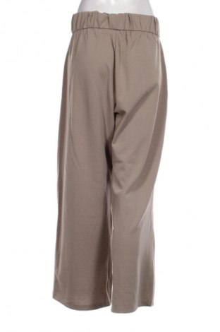 Damskie spodnie Jdy, Rozmiar XL, Kolor Beżowy, Cena 43,99 zł