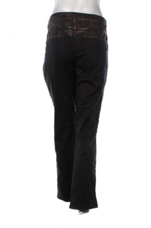 Damskie spodnie Madeleine, Rozmiar XL, Kolor Kolorowy, Cena 92,99 zł