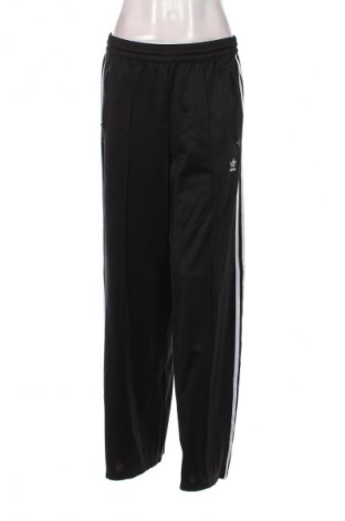 Damskie spodnie sportowe Adidas Originals, Rozmiar M, Kolor Czarny, Cena 253,33 zł
