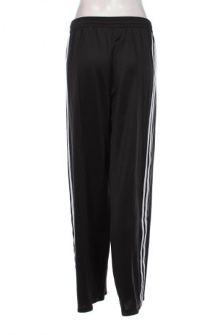 Damskie spodnie sportowe Adidas Originals, Rozmiar M, Kolor Czarny, Cena 253,33 zł
