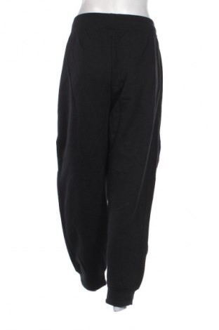 Damskie spodnie sportowe Calvin Klein, Rozmiar XL, Kolor Kolorowy, Cena 464,99 zł