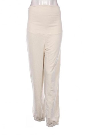 Дамско спортно долнище H&M Mama, Размер L, Цвят Бежов, Цена 29,00 лв.