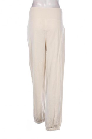 Дамско спортно долнище H&M Mama, Размер L, Цвят Бежов, Цена 29,00 лв.