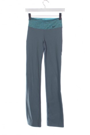 Damskie spodnie sportowe Nike, Rozmiar XS, Kolor Szary, Cena 94,25 zł