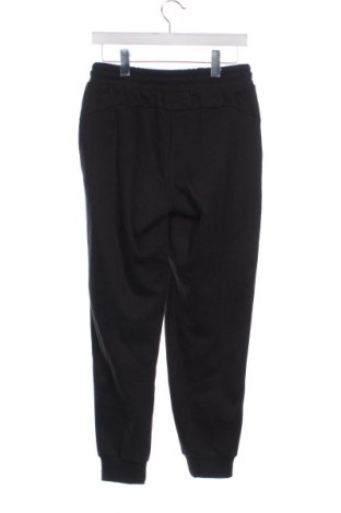 Дамско спортно долнище PUMA, Размер XS, Цвят Черен, Цена 93,99 лв.