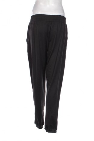 Дамско спортно долнище PUMA, Размер L, Цвят Черен, Цена 93,99 лв.