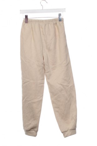 Детско спортно долнище Unbranded, Размер 11-12y/ 152-158 см, Цвят Бежов, Цена 18,99 лв.