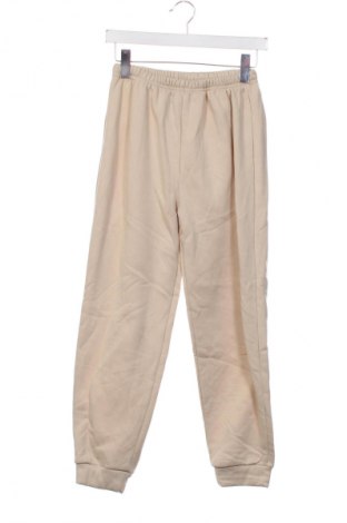 Детско спортно долнище Unbranded, Размер 11-12y/ 152-158 см, Цвят Бежов, Цена 18,99 лв.