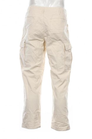 Herrenhose Uniqlo, Größe S, Farbe Ecru, Preis € 11,99