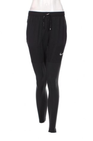 Дамско спортно долнище Nike, Размер S, Цвят Черен, Цена 87,00 лв.