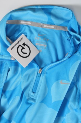 Dziecięca sportowa bluzka Nike, Rozmiar 12-13y/ 158-164 cm, Kolor Niebieski, Cena 252,87 zł
