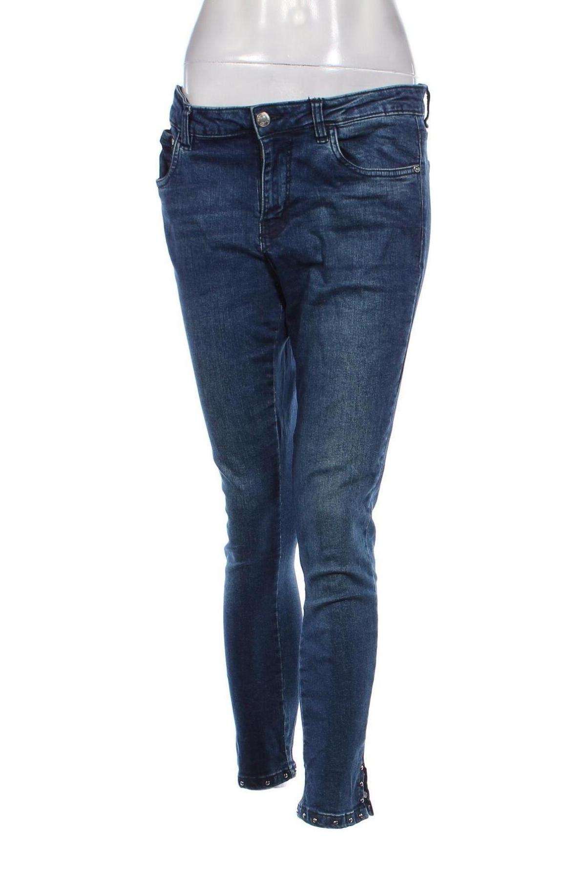 Damskie jeansy Infinity Woman, Rozmiar L, Kolor Niebieski, Cena 92,99 zł