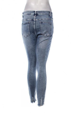 Damskie jeansy Unbranded, Rozmiar L, Kolor Niebieski, Cena 66,67 zł