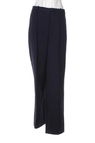 Damskie spodnie Tommy Hilfiger, Rozmiar L, Kolor Niebieski, Cena 674,99 zł