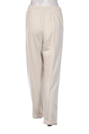 Damskie spodnie Unbranded, Rozmiar M, Kolor Beżowy, Cena 44,99 zł