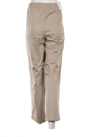 Damskie spodnie Uniqlo, Rozmiar XL, Kolor Beżowy, Cena 213,79 zł