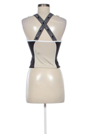 Дамски спортен топ PUMA, Размер S, Цвят Многоцветен, Цена 34,00 лв.