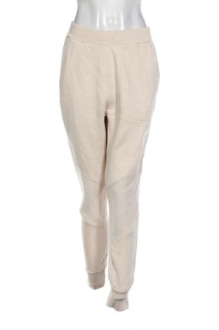 Damskie spodnie sportowe Adidas, Rozmiar S, Kolor Beżowy, Cena 122,99 zł