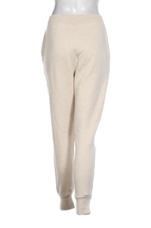 Damskie spodnie sportowe Adidas, Rozmiar S, Kolor Beżowy, Cena 122,99 zł