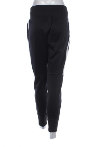 Pantaloni trening de femei Nike, Mărime M, Culoare Negru, Preț 154,99 Lei