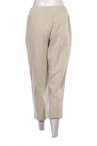 Damskie spodnie sportowe PUMA, Rozmiar M, Kolor Beżowy, Cena 101,99 zł