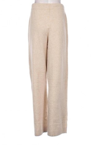 Dámské tepláky Tommy Hilfiger, Velikost L, Barva Béžová, Cena  2 279,00 Kč