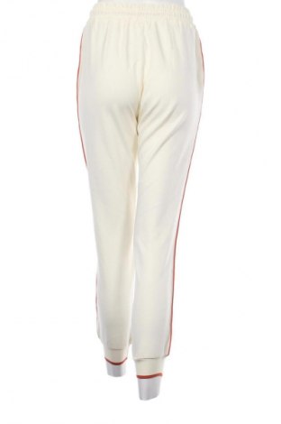 Дамско спортно долнище Unbranded, Размер M, Цвят Екрю, Цена 17,99 лв.