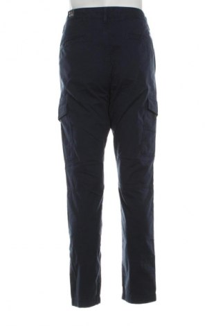 Męskie spodnie Tommy Jeans, Rozmiar L, Kolor Niebieski, Cena 445,99 zł