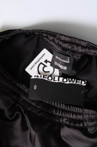 Γυναικείο παντελόνι UNFOLLOWED x ABOUT YOU, Μέγεθος M, Χρώμα Μαύρο, Τιμή 7,62 €