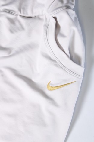 Γυναικείο αθλητικό παντελόνι Nike, Μέγεθος S, Χρώμα Γκρί, Τιμή 20,97 €