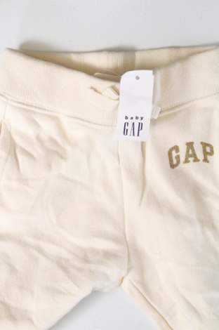 Детско спортно долнище Gap Baby, Размер 18-24m/ 86-98 см, Цвят Екрю, Цена 21,99 лв.