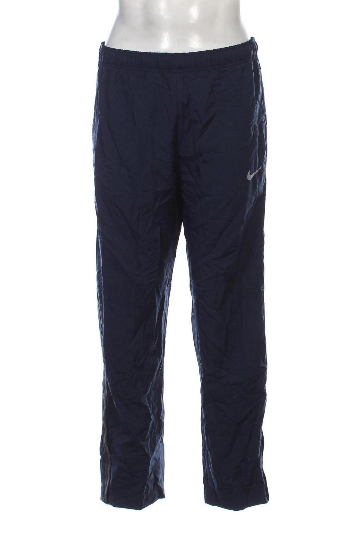 Pantaloni trening de bărbați Nike, Mărime L, Culoare Albastru, Preț 288,99 Lei